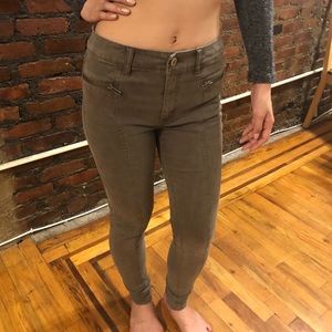 High rise skinny pants with zippers and detailing